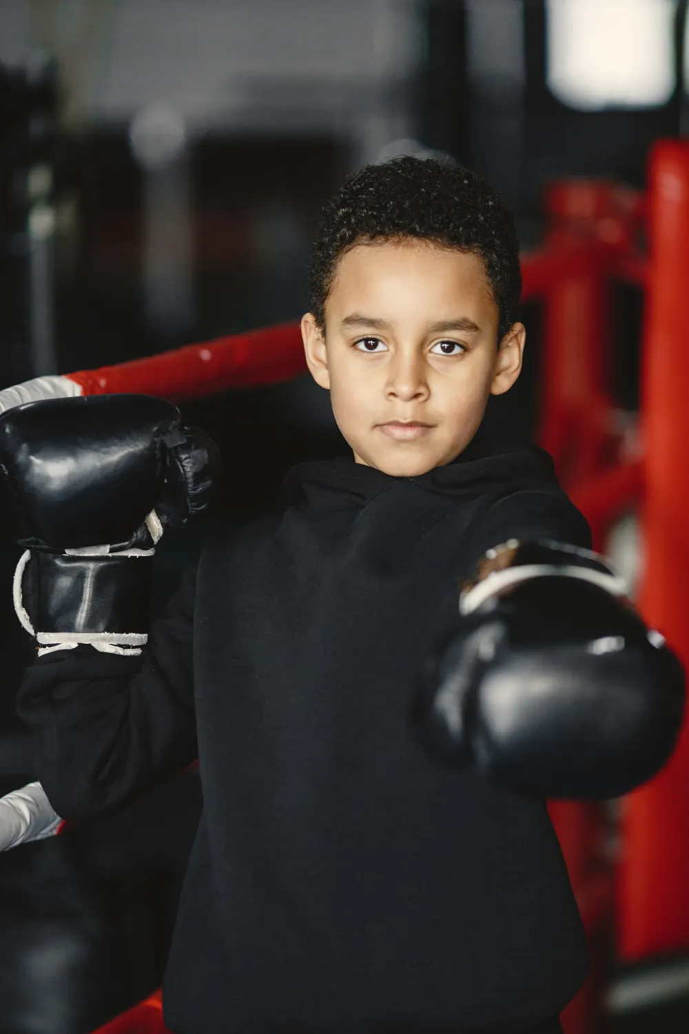 46294 Young hardworking boxer learning to box. child at sport center. kid taking up a new hobby<br />