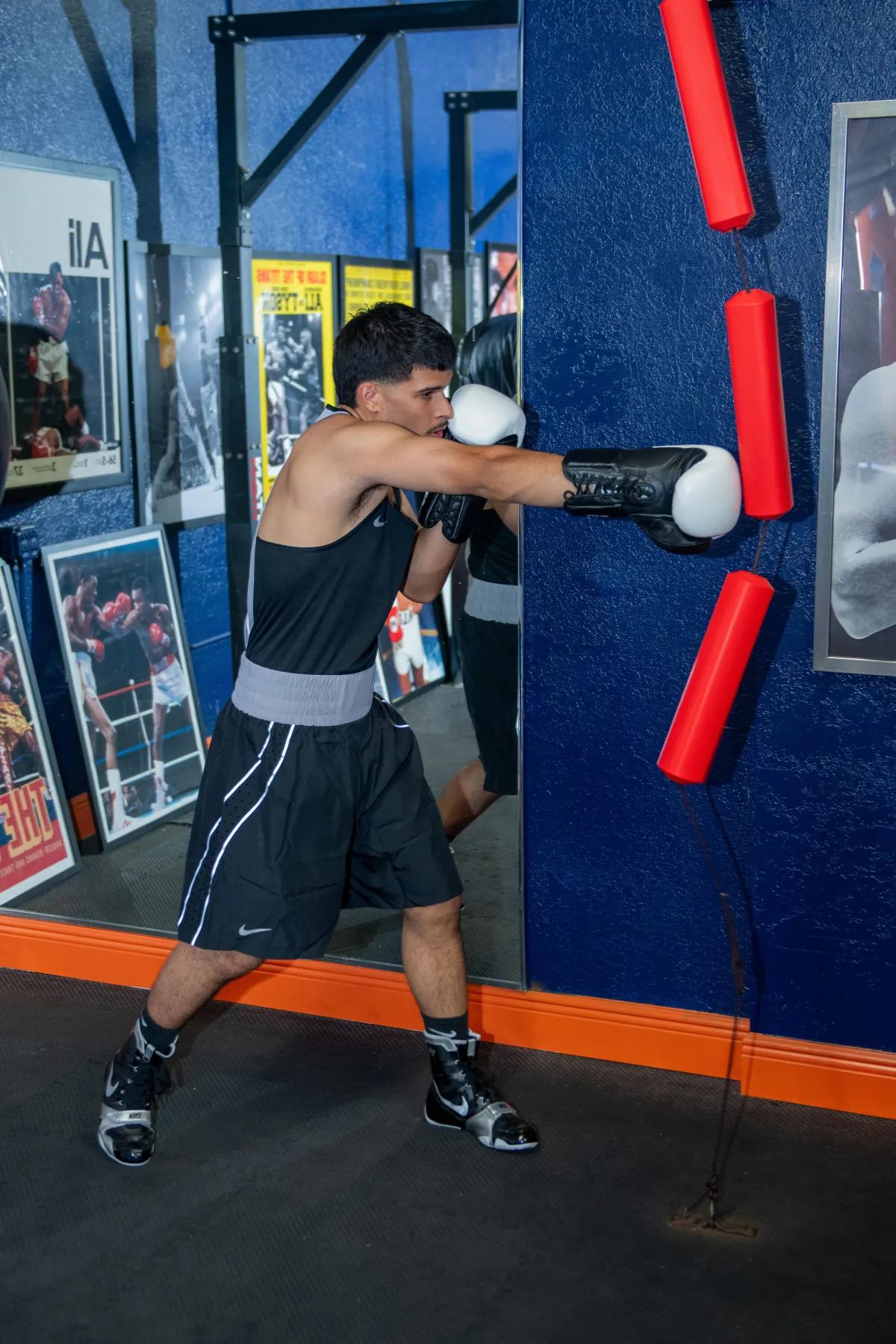 gym photo Side view boy training at gym<br />